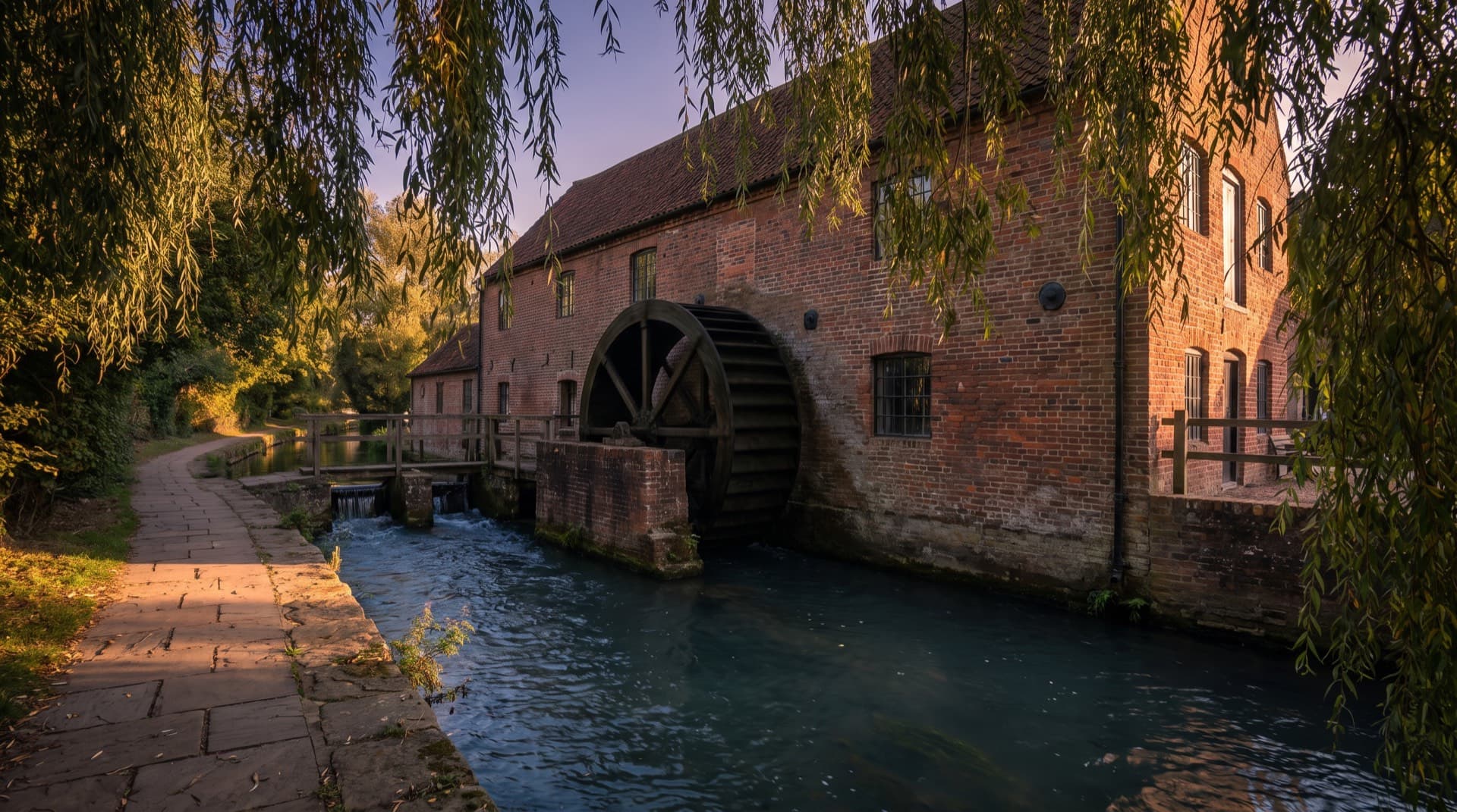 The old watermill and waterwheel on the River Wandle near Colliers Wood