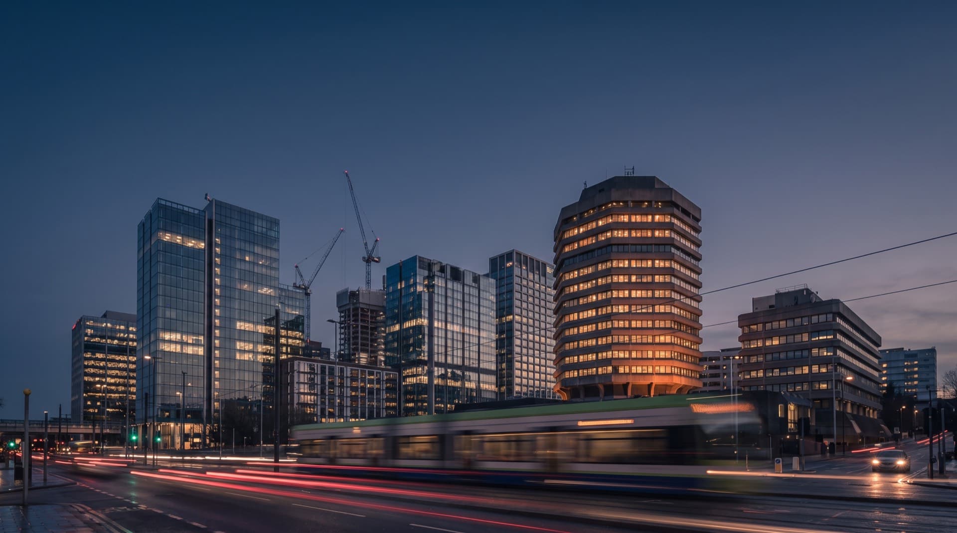 Croydon's town-centre skyline and tram lights at dusk